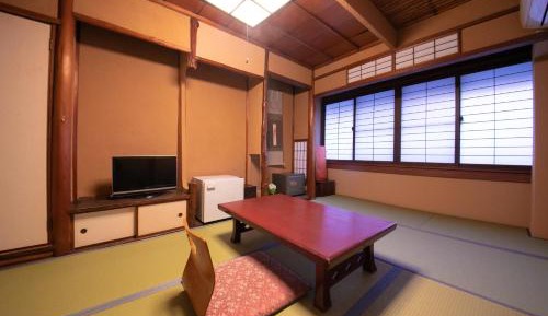 Quadruple Room with Shared Bathroom