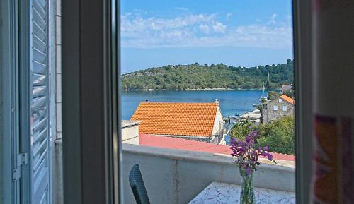 One-Bedroom Apartment with Balcony and Sea View