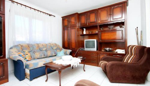 Three-Bedroom Apartment with Terrace and Sea View