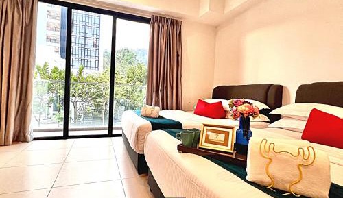 Deluxe Family Studio Suite with Balcony