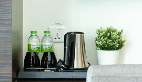 Family Triple Room with One Queen Bed and One Single Bed