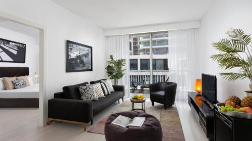 One-Bedroom Apartment with Balcony & City View