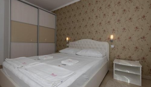 One-Bedroom Apartment with Balcony and Partial Sea View