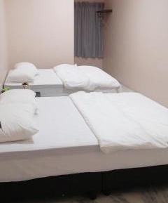 Quadruple Room with Private Bathroom
