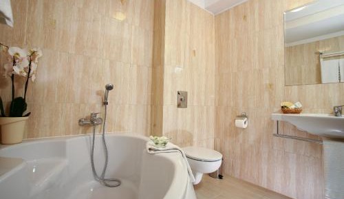 Suite With King Bed And Sofa