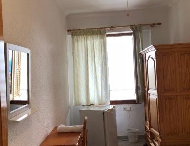 Single Room with Shared Bathroom