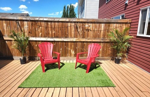 Southeast Edmonton House | House in Summerside with a huge patio and an extra tall garage