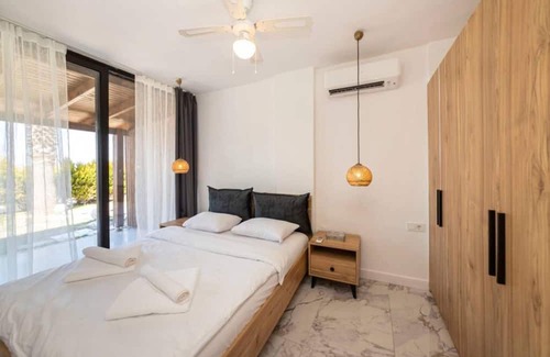 Meselik Apartment | Pleasant Home with Shared Pool in Bodrum