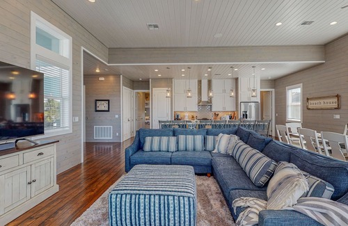 Port Aransas House | KD671 Luxurious Home with Private Heated Pool and Oasis, Partial Gulf Views and Golf Cart Included!