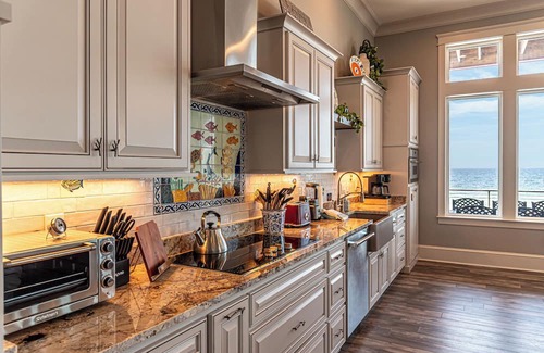 Fort Morgan House | Postcard views from your home equipped with a dream kitchen! Come enjoy luxurious living in a highly sought-after neighborhood in Fort Morgan.