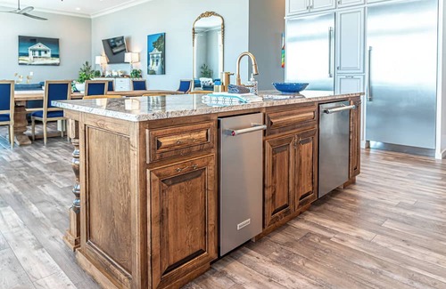 Fort Morgan House | Postcard views from your home equipped with a dream kitchen! Come enjoy luxurious living in a highly sought-after neighborhood in Fort Morgan.