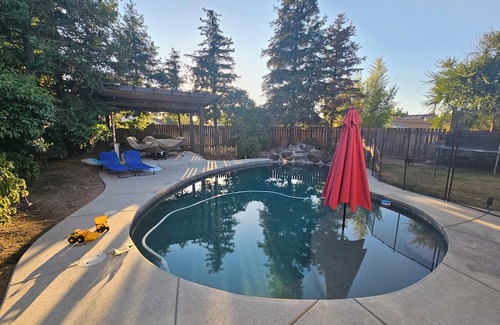 Clovis House | Spacious 4-bedroom house in delightful Clovis with WiFi, AC, Pool, Patio