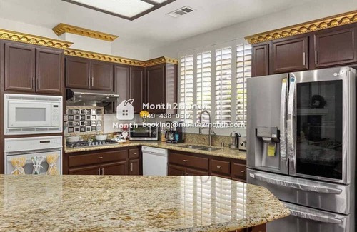 Greenacres House | Back Yard with Lawn & Dedicate Office & Single-Story