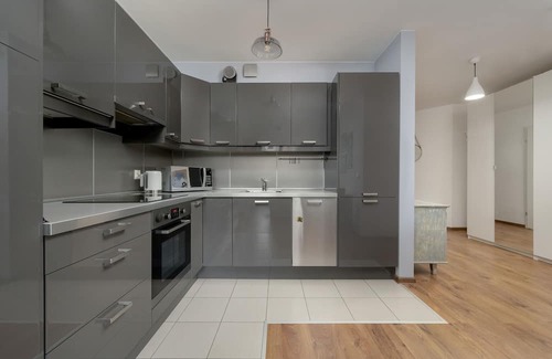Krzyki Apartment | Modern Apartment With Balcony by Renters