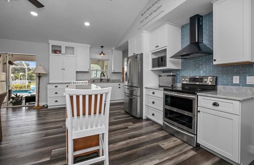 Harbour Heights House | Paradise Awaits. Beautiful Home with Pool located on a canal with dock