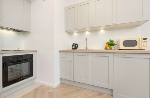 Wlochy Apartment | Modern Apartment With Balcony by Renters