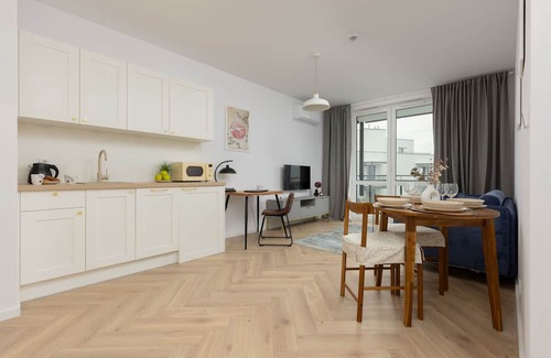 Wlochy Apartment | Modern Apartment With Balcony by Renters