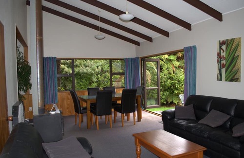 Franz Josef Glacier House | Central & Relaxing, park up and enjoy rainforest views.