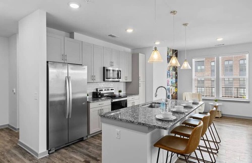 Metrocenter - North Rhodes Park Apartment | Spacious 2BR - 9min to Broadway!