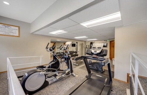 Four O'Clock Condo | Sunny ski-in condo with mountain views, hot tubs, pool, fireplace, firepit, & gym