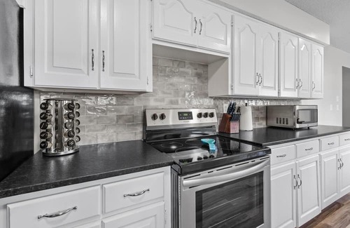 Joplin House | Stylish Rancher in Quiet, Tree Lined Neighborhood.