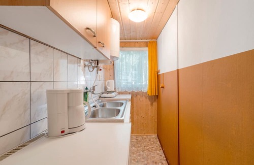 Kollm House | Bungalow '7 - Finnhütte' with Private Terrace and Shared Garden