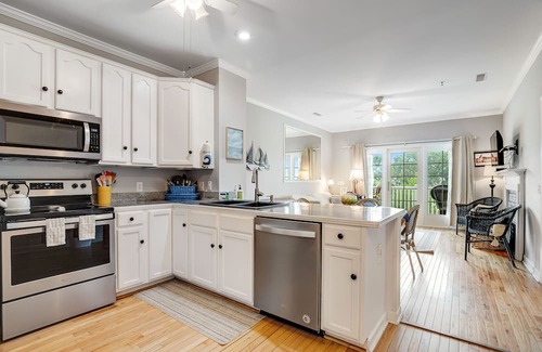 Folly Beach Condo | 2nd-floor retreat with screened porch, shared pool, WiFi, central AC & elevator