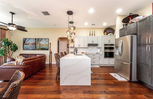 Tropic Palms House | Waterfront Getaway! 3BR on Canal + Row Boat – Near Beach & Atlantic Ave Fun!