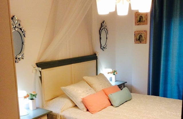 Design apartment, with a private terrace of 140 meters 20 meters from the sea and parking