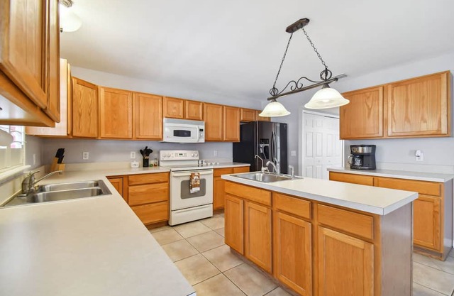 Heated pool huge 4 bedroom home welcomes your family and friends!