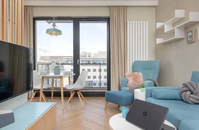 Bright Blue Apartment by Renters