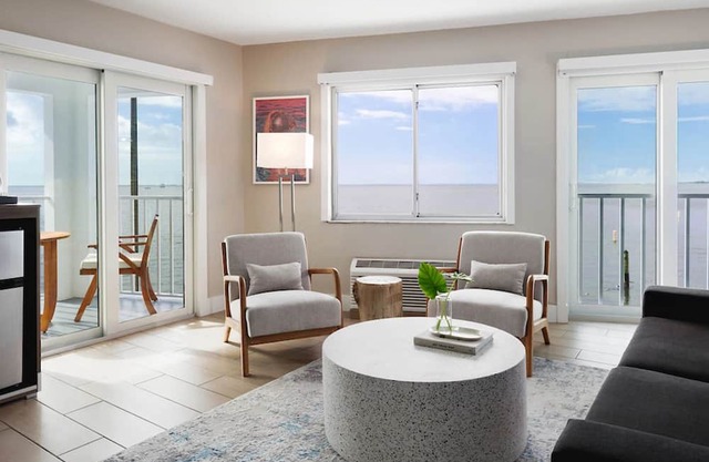 Gulf Coast Retreat | Lounge by Two Pools | Private Beach & Marina Access