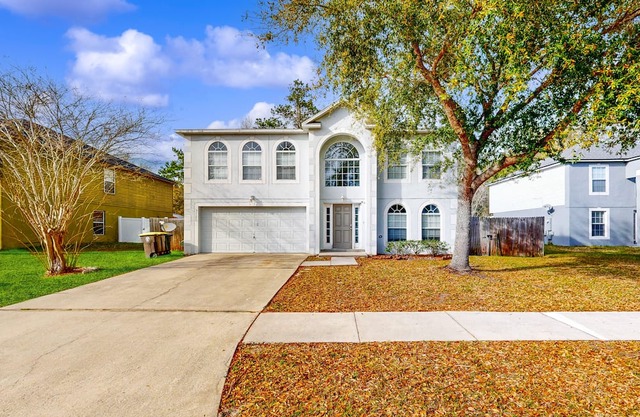 Royal Retreat with enclosed yard and screened in back patio