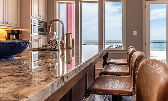 Fort Morgan House | Postcard views from your home equipped with a dream kitchen! Come enjoy luxurious living in a highly sought-after neighborhood in Fort Morgan.