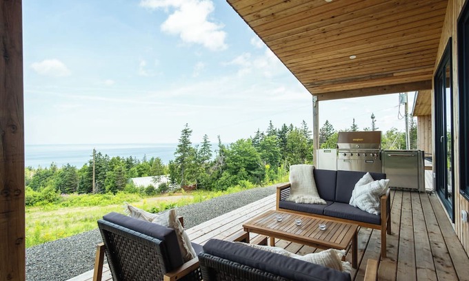 Inverness House | Modern 4 Bedroom, 4.5 bath home near Cabot Links with ocean views and sunsets.
