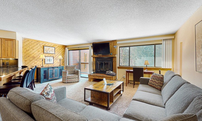 Four O'Clock Condo | Sunny ski-in condo with mountain views, hot tubs, pool, fireplace, firepit, & gym