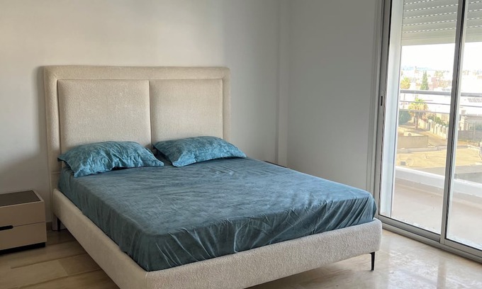 Bou Mhel el-Bassatine Apartment | Cool 2-bedroom apartment with AC in Bou Mhel el-Bassatine